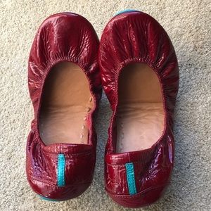 Ruby red patent Tieks